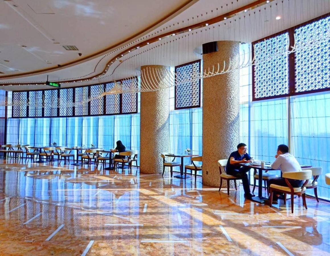 Days Hotel & Suites China Town---Five Minutes To Reach Changsha Station, The Metro Line 2 & Line 6 Are Nearby,Free Gym & Laundromat,Chinese And Western Buffet Breakfast Is Offered On The 31St Floor Ngoại thất bức ảnh